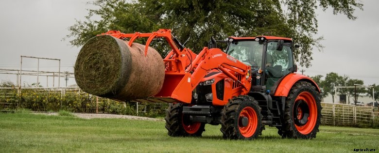 Kubota M7 tractor with hay bale